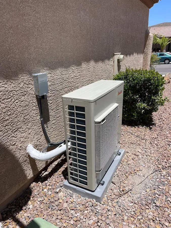 Residential air conditioning condenser unit in Wood River